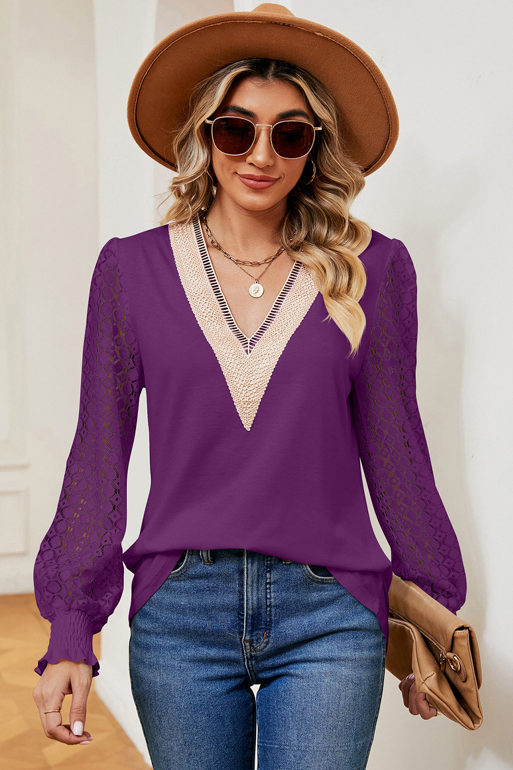Violet knit top with lace sleeves and V-neck trim, cuffed wrists