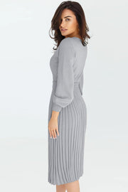 Light Gray belted knit midi dress with pleated skirt and balloon sleeves.