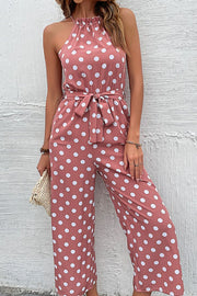 Pink polka dot halter neck palazzo jumpsuit with tie belt