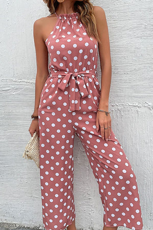 Pink polka dot halter neck palazzo jumpsuit with tie belt