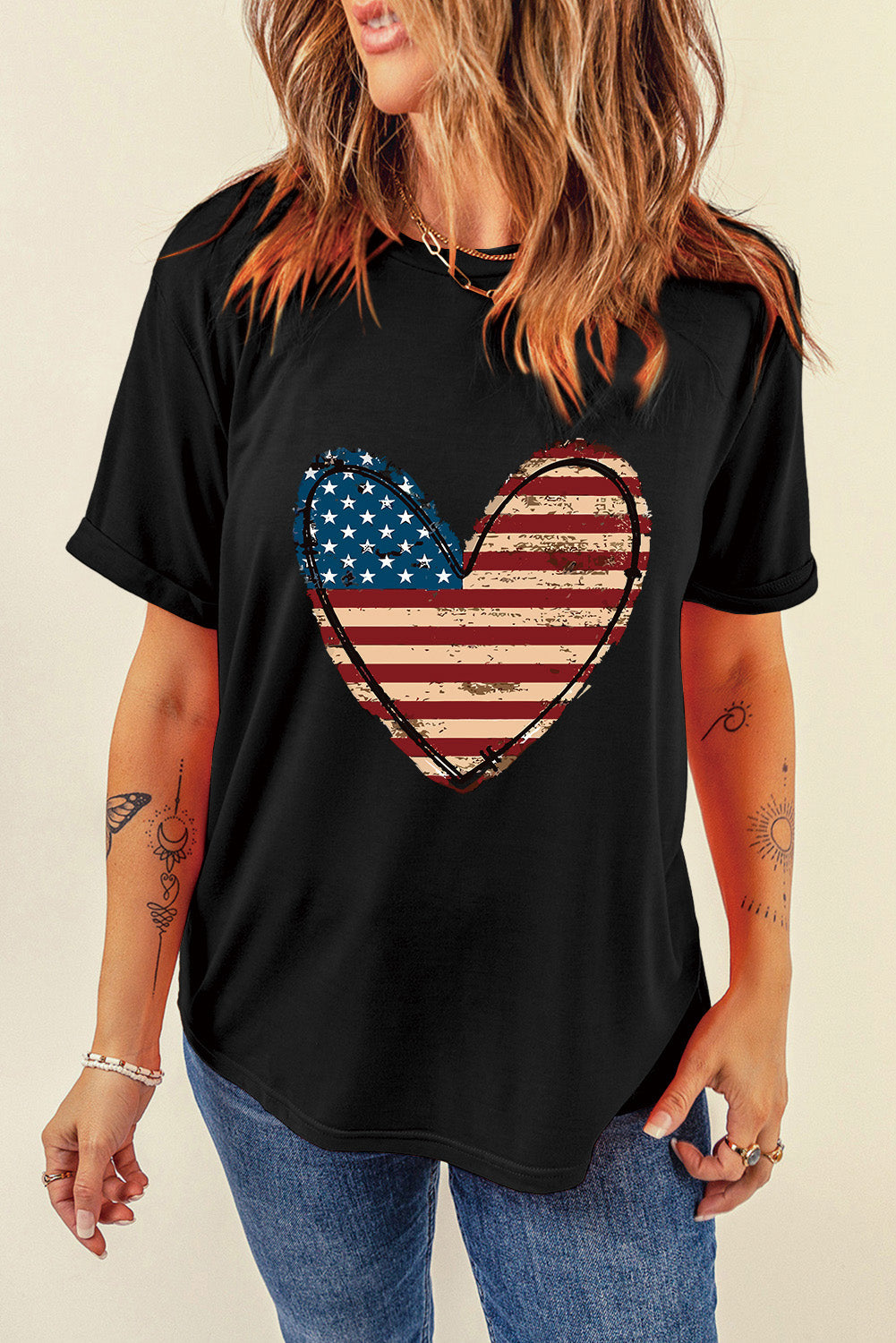Black t-shirt with distressed Americana heart graphic, crew neck, short sleeves.
