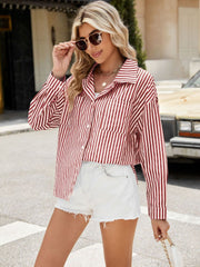 Striped oversized shirt in scarlet with button front and chest pockets.