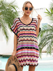 Chevron knit beach cover-up with multicolor stripes and V-neck.