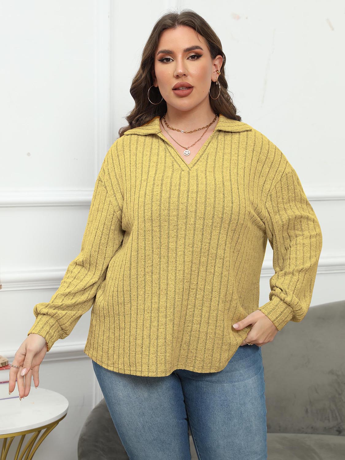 Relaxed ribbed polo top in Banana Yellow with vertical stripes and a V-neck.