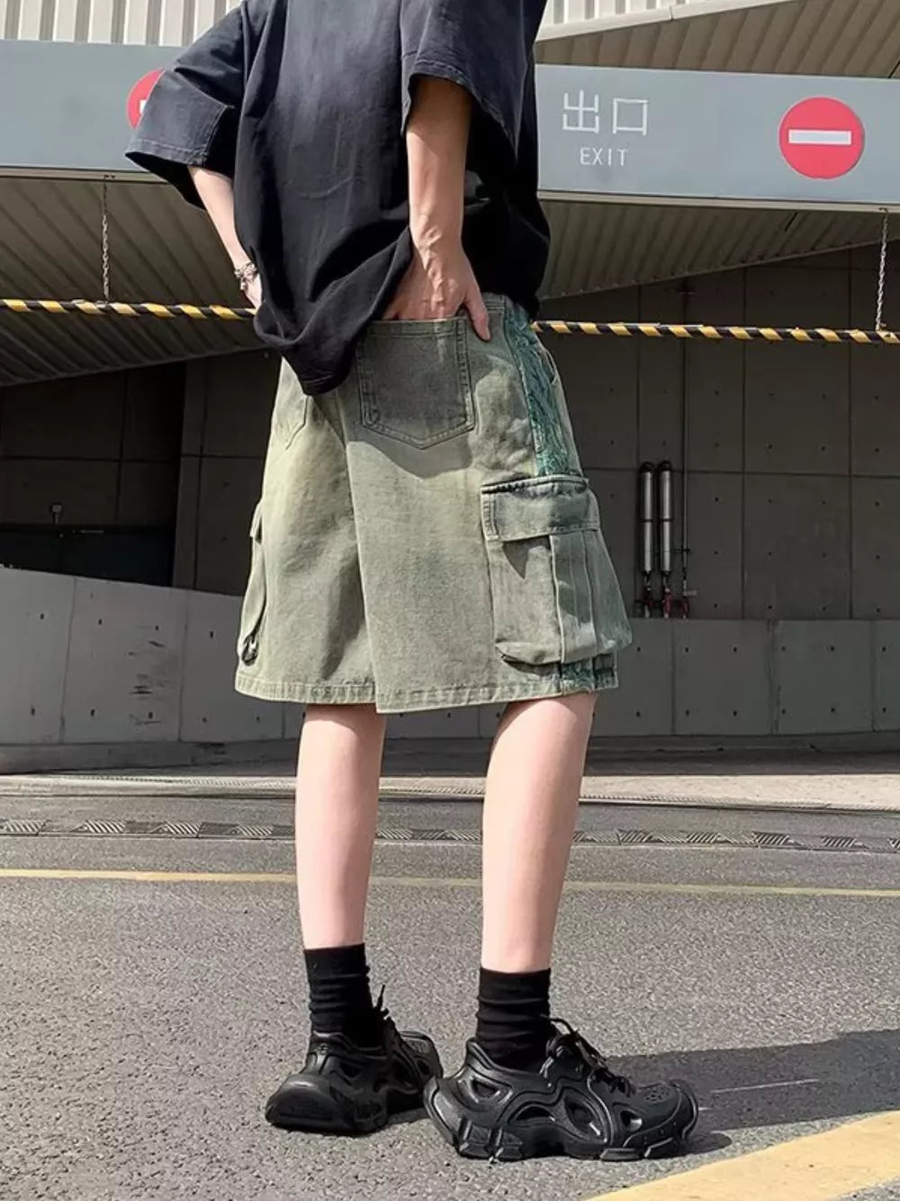Men's vintage cargo denim shorts in Air Force Blue with braided drawstring and distressed details.