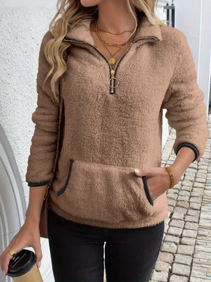 Brown fleece quarter zip pullover with a kangaroo pocket and black trim.