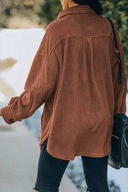 Fleece shirt jacket in Chestnut with button cuffs and a relaxed fit.