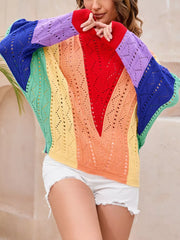 Vibrant color-blocked openwork knit sweater with a V-neck and long sleeves.