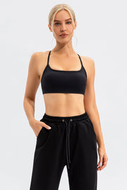 Black sports bra with thin straps and square neckline