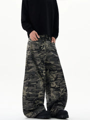 Oversized camouflage cargo sweatpants with multiple pockets and a relaxed fit.
