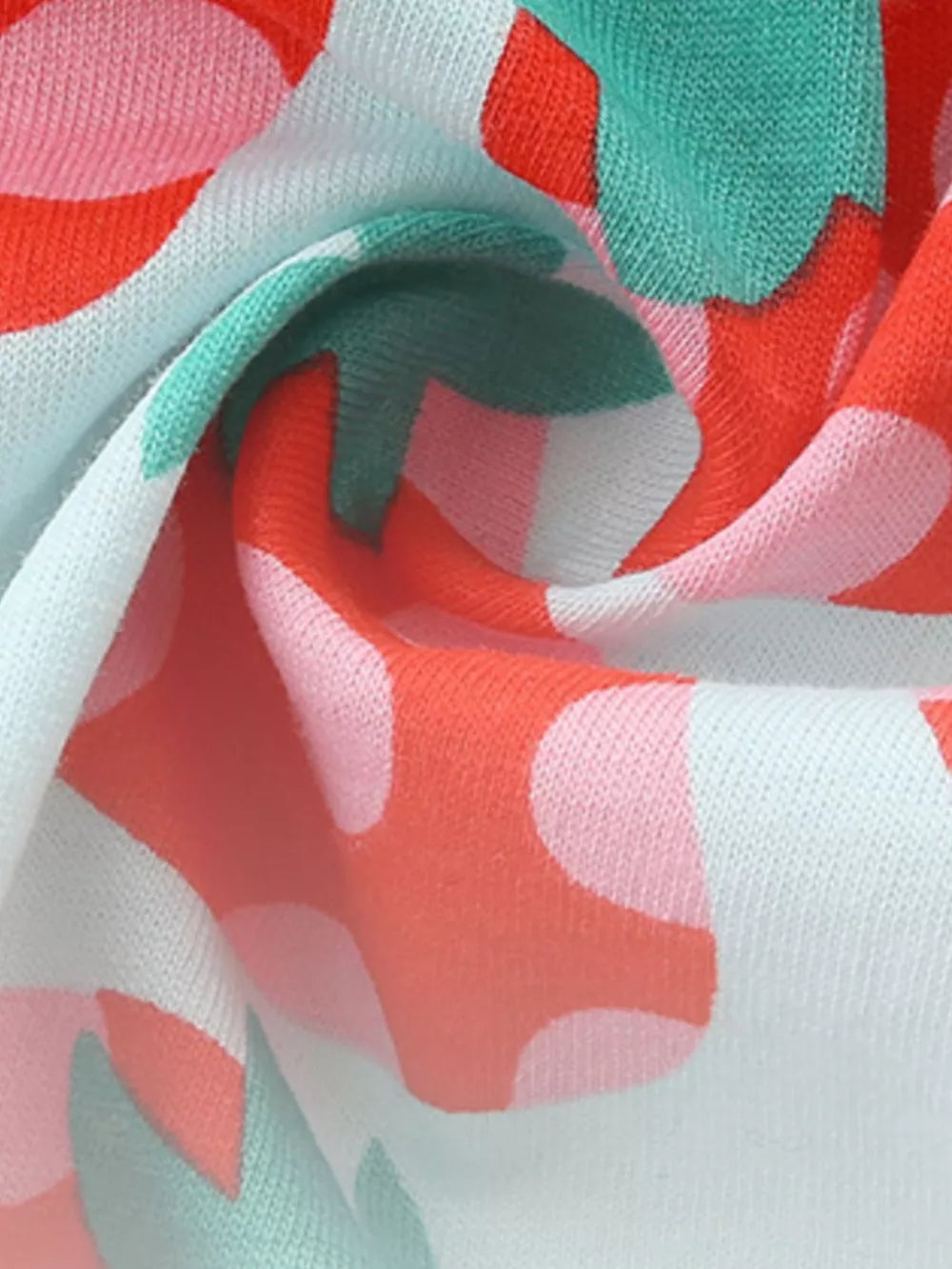Toddler dress in cotton with a whimsical strawberry print in red, pink, and mint green.