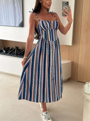 Tie-shoulder midi dress with a colorful zigzag stripe pattern and a-line cut.
