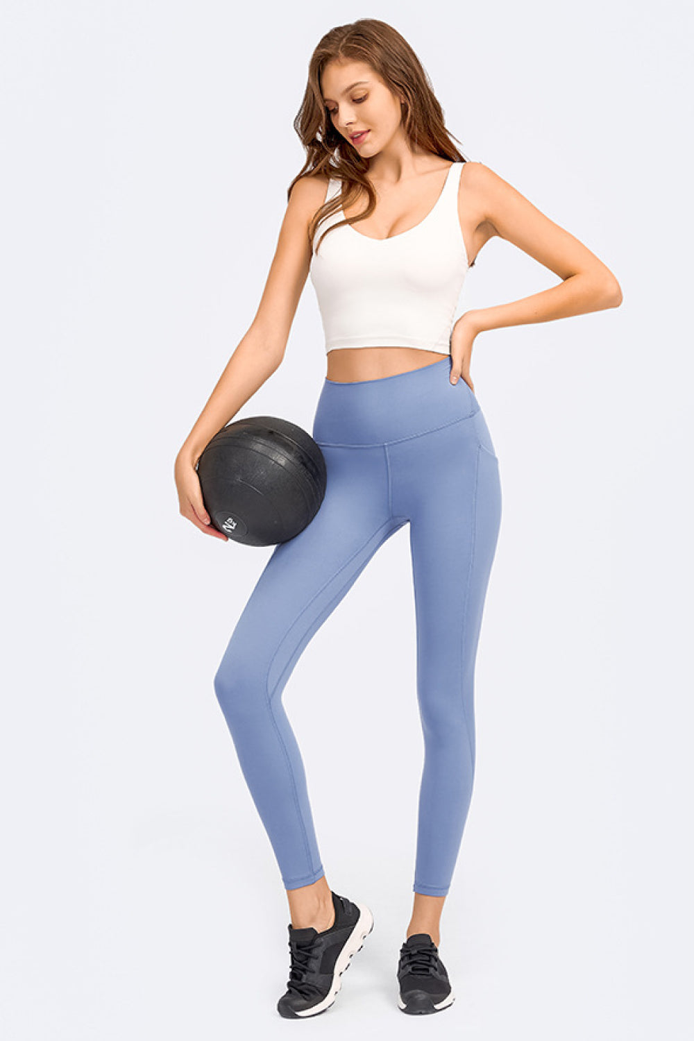 Sculpted Scoop Neck Crop Top in white with a scoop neckline and sleeveless cut.
