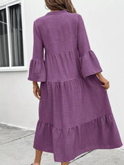 Purple tiered ruffle hem midi dress with bell sleeves and button front.