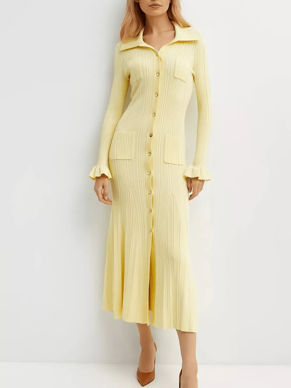 Yellow knit midi dress with polo collar, button front, and ruffled cuffs.