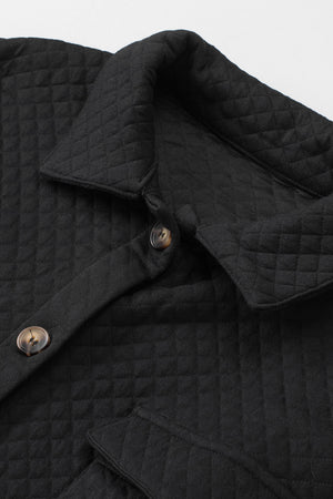 Black quilted overshirt with button details and patch pocket flap.