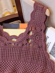 Crochet floral overlay tank top in deep purple with scalloped neckline and open knit details.