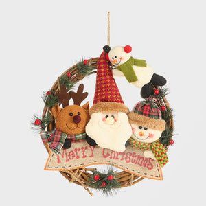 Festive wreath with plush Santa, reindeer, snowman figures and Merry Christmas banner.