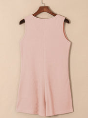 Blush pink waffle knit button-down romper with pockets, sleeveless, round neck
