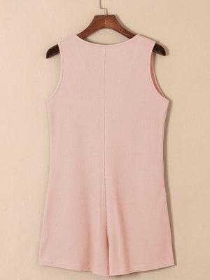 Blush pink waffle knit button-down romper with pockets, sleeveless, round neck