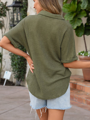 Moss waffle-knit collared shirt with short sleeves and button detail.