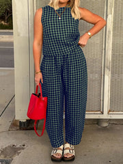Gingham cropped tank and tapered trousers set in dark green and navy blue.