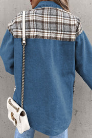 Light blue denim shirt jacket with plaid paneling on the back shoulders.