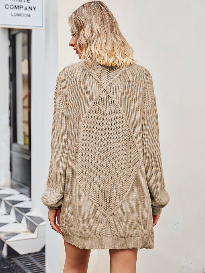Khaki cable knit longline cardigan with diamond pattern detail on back.