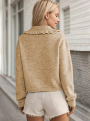 Tan knit cardigan with frilled collar and button front detail.
