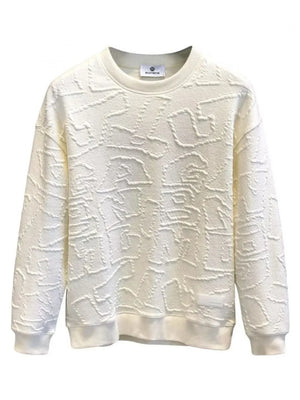 Ivory crewneck sweatshirt with embossed geometric texture, crew neck, long sleeves, and ribbed cuffs and hem.