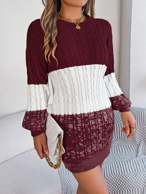 Colorblock cable knit mini dress in burgundy and white acrylic with crew neck.