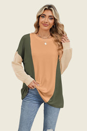 Colorblock waffle knit pullover with crew neck and long sleeves in tan, moss green, and cream.