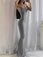 Dark gray spaghetti strap bodycon maxi dress with a flared hem.
