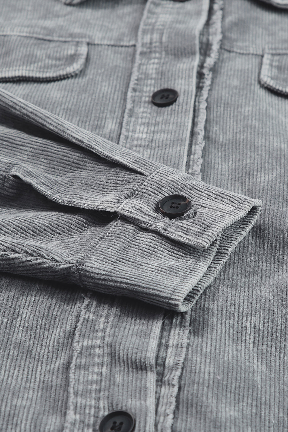 Textured corduroy overshirt in Cloudy Blue with button details and faded wash.
