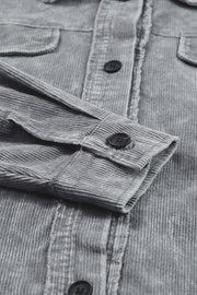 Textured corduroy overshirt in Cloudy Blue with button details and faded wash.