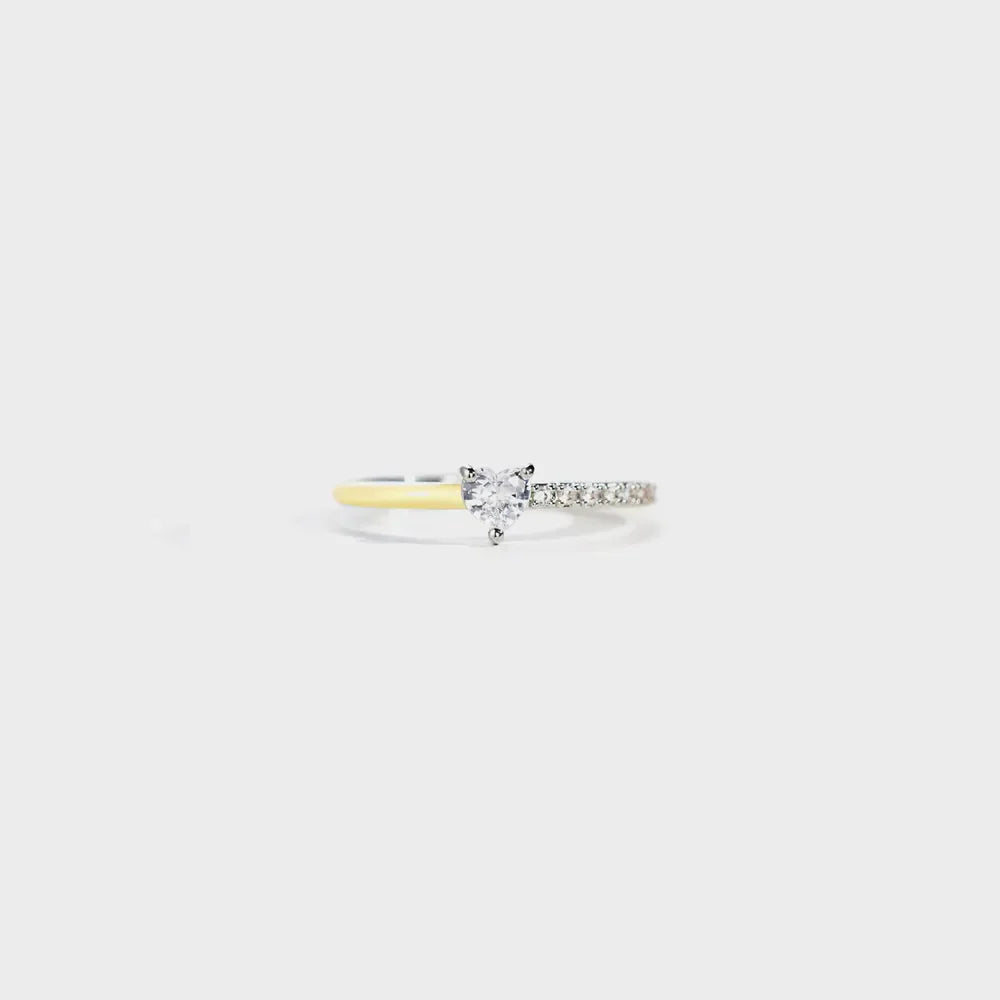 Sterling silver ring with heart-shaped stone and pave band, two-tone band.