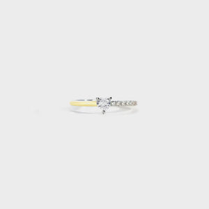 Sterling silver ring with heart-shaped stone and pave band, two-tone band.