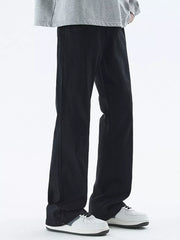 Black relaxed fit cotton jeans for men with a straight leg cut.