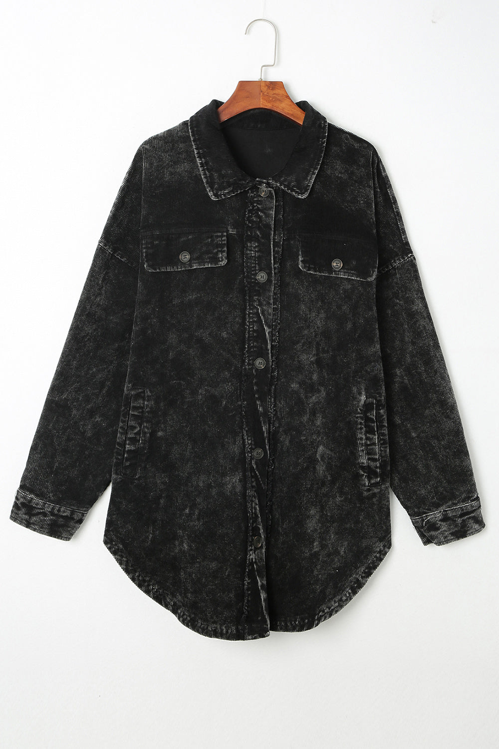 Black textured corduroy overshirt with faded wash, button front and chest pockets.