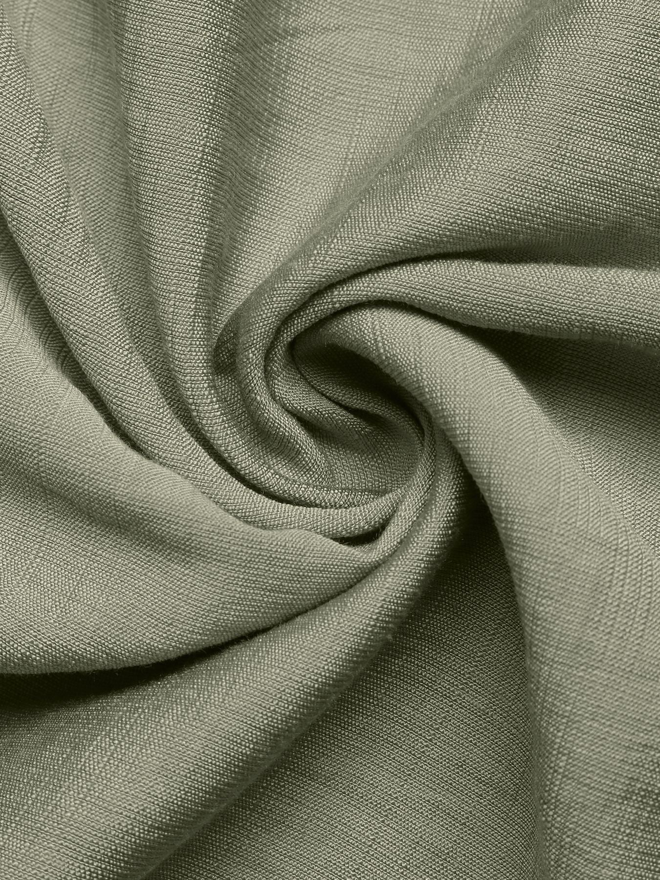 Elegant Smocked Waist Maxi Dress fabric detail in sage green linen blend with subtle texture.