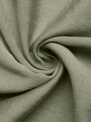 Elegant Smocked Waist Maxi Dress fabric detail in sage green linen blend with subtle texture.