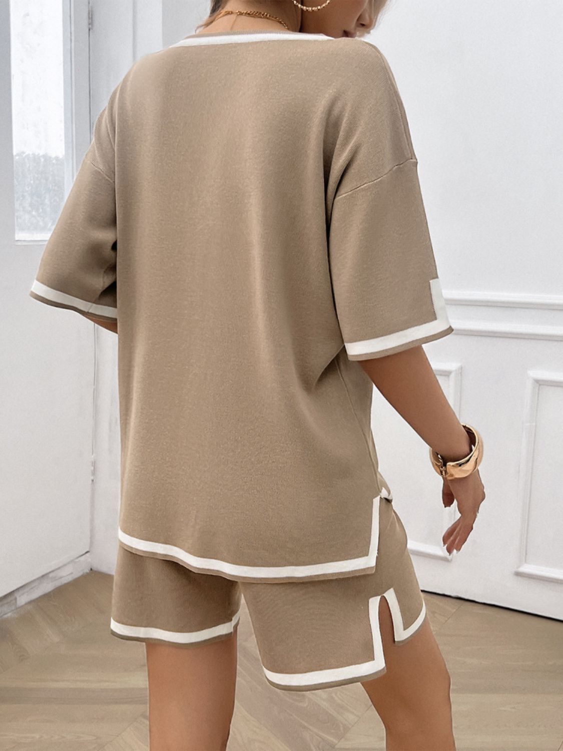 Mocha knit lounge set with contrast white trim on neckline, sleeves, and shorts.