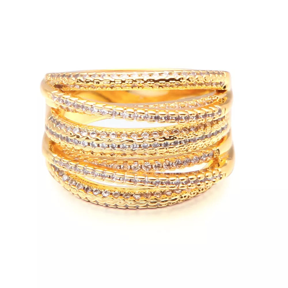 Gold-plated multi-row ring with clear stones and textured bands.