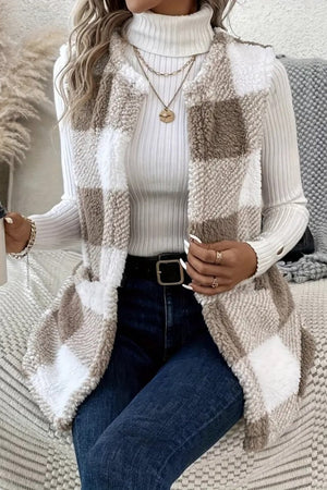 Oversized sherpa gilet in tan and white buffalo check pattern, with a fuzzy texture.