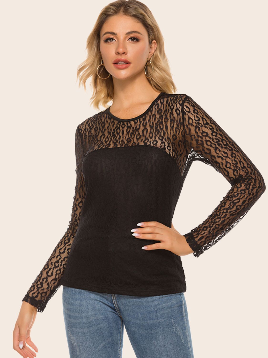 Black long sleeve lace overlay blouse with leopard pattern on sheer sleeves and neckline.
