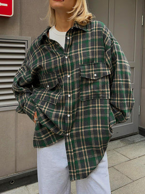 Plaid pocketed button-up shacket in dark green with button details and a casual fit.
