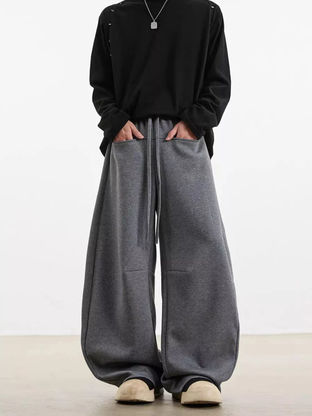 Men's gray wide-leg sweatpants with drawstring and pockets