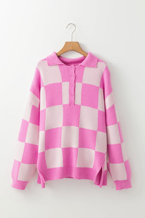 Fuchsia pink checkered knit polo sweater with button neckline and long sleeves.