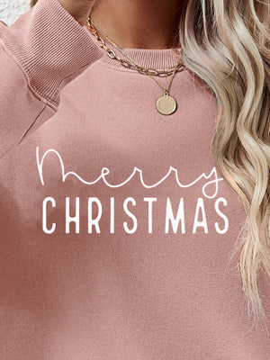 Blush pink crewneck sweatshirt with white Merry Christmas graphic, casual style.