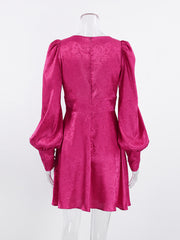 Vibrant cerise mini dress with lantern sleeves and floral jacquard pattern
